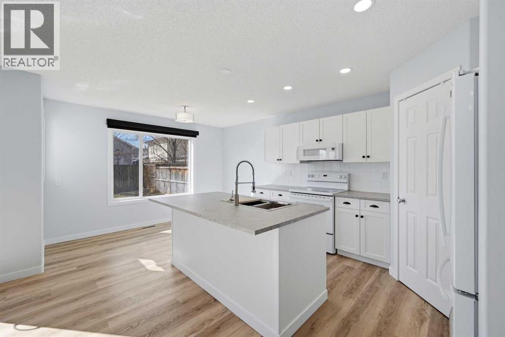 69 Bridleridge Road Sw, Calgary, Alberta  T2Y 4E1 - Photo 10 - A2302273