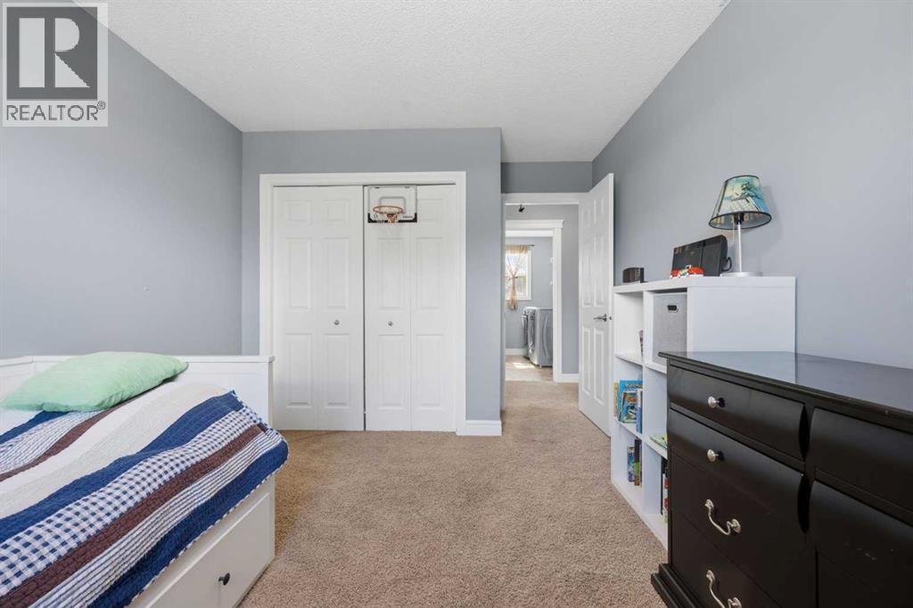 399 Coopers Drive Sw, Airdrie, Alberta  T4B 0C8 - Photo 24 - A2301883