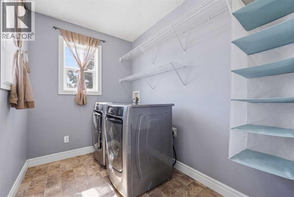 399 Coopers Drive Sw, Airdrie, Alberta  T4B 0C8 - Photo 32 - A2301883