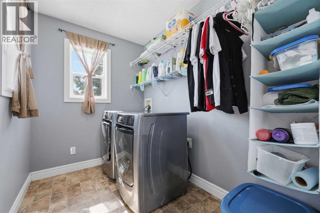 399 Coopers Drive Sw, Airdrie, Alberta  T4B 0C8 - Photo 35 - A2301883