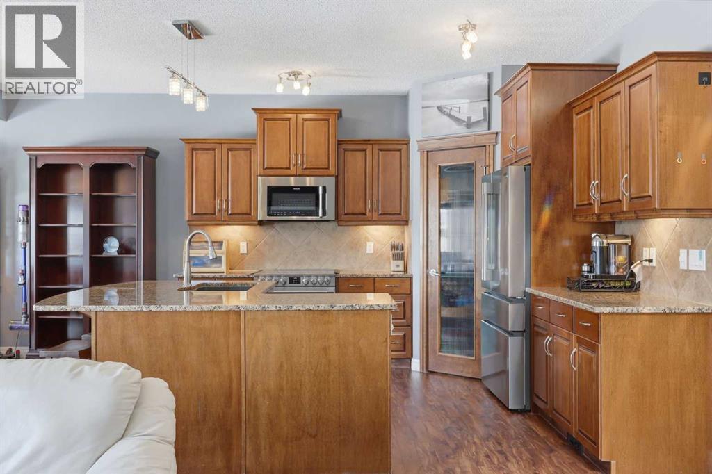 399 Coopers Drive Sw, Airdrie, Alberta  T4B 0C8 - Photo 6 - A2301883