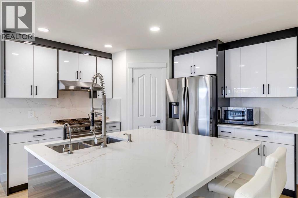 447 Tuscany Ridge Heights Nw, Calgary, Alberta  T3L 2W7 - Photo 4 - A2293440