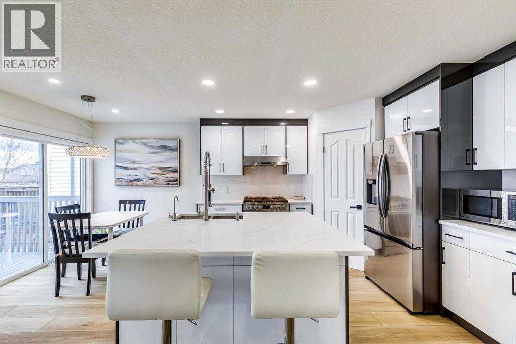 447 Tuscany Ridge Heights Nw, Calgary, Alberta  T3L 2W7 - Photo 6 - A2293440