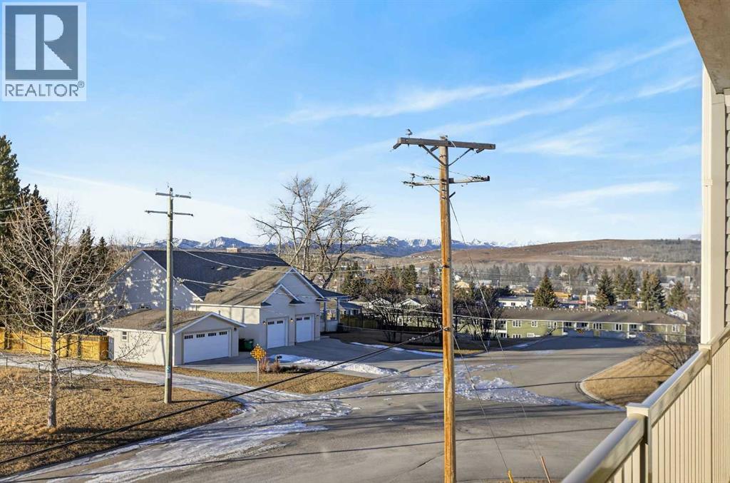 302, 400 1 Avenue Se, Diamond Valley, Alberta  T0L 0H0 - Photo 21 - A2286296