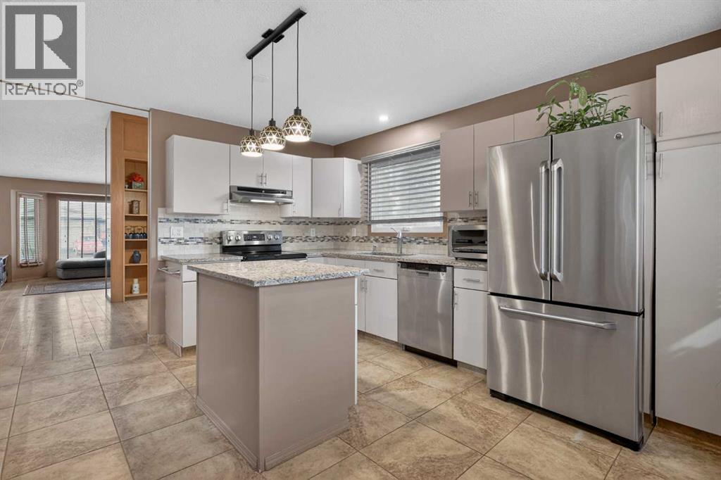 80 Deerbrook Road Se, Calgary, Alberta  T2J 6L6 - Photo 2 - A2302425