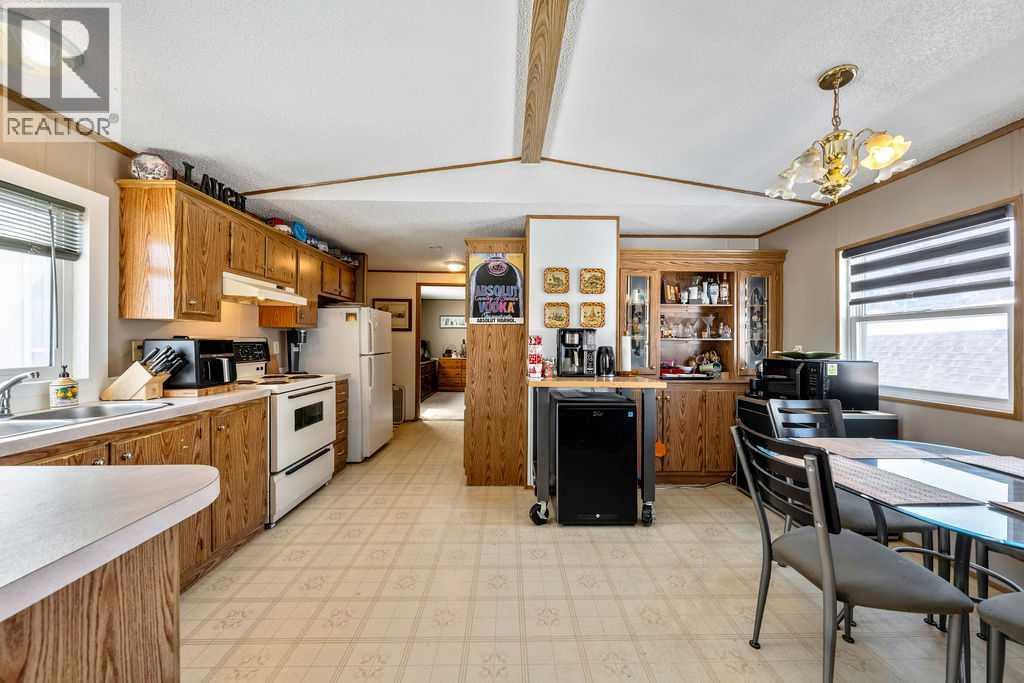 131 Heritage Drive, Okotoks, Alberta  T1S 1M4 - Photo 7 - A2303205