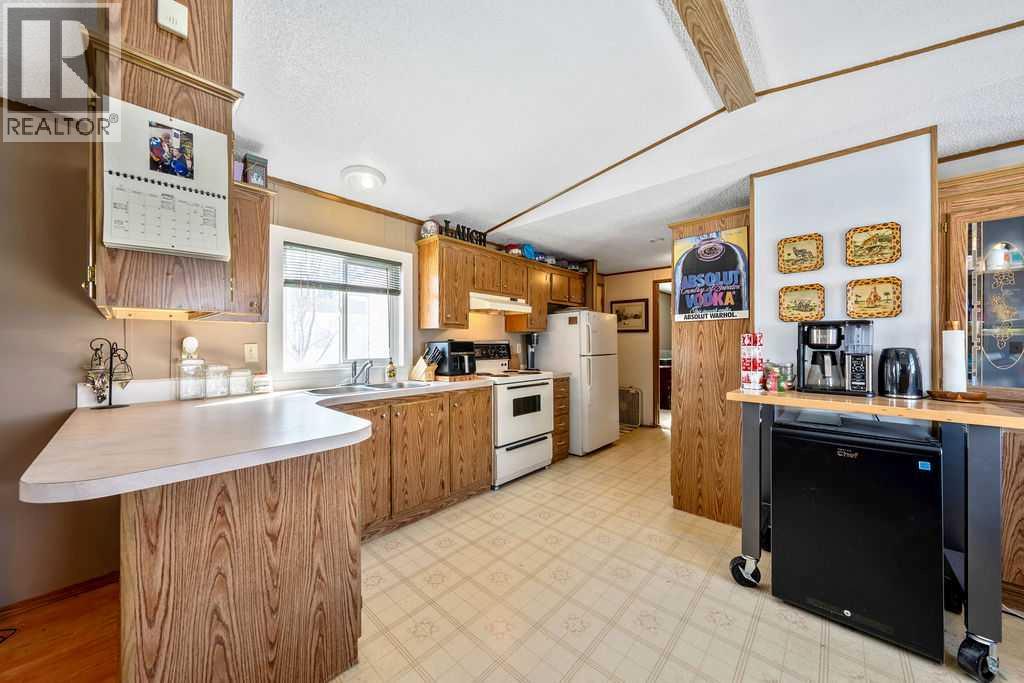 131 Heritage Drive, Okotoks, Alberta  T1S 1M4 - Photo 9 - A2303205