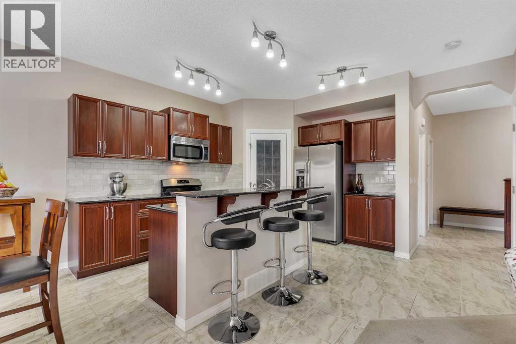 32 Panatella Row Nw, Calgary, Alberta  T3K 0V5 - Photo 5 - A2301630