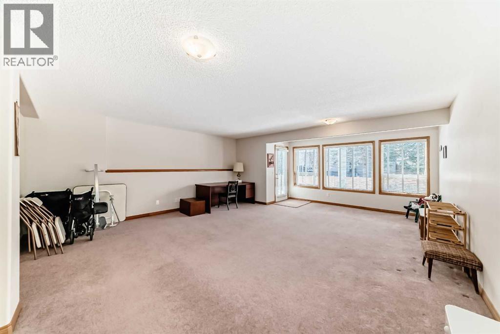 220 Rocky Ridge Villas Nw, Calgary, Alberta  T3G 4R3 - Photo 31 - A2297086