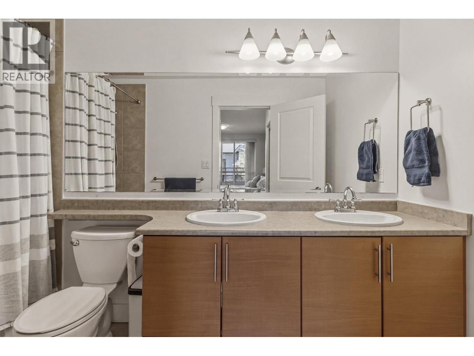 217 1211 Village Green Way, Squamish, British Columbia  V8B 0R7 - Photo 13 - R3113091