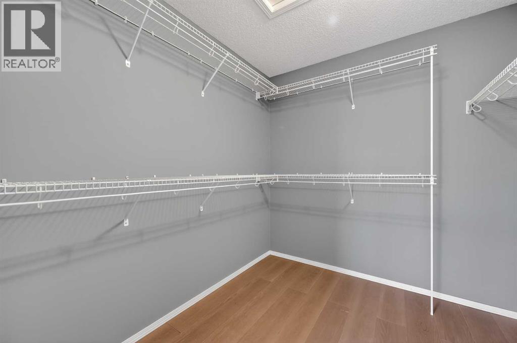 99 Evansbrooke Manor Nw, Calgary, Alberta  T2P 1C9 - Photo 23 - A2301438