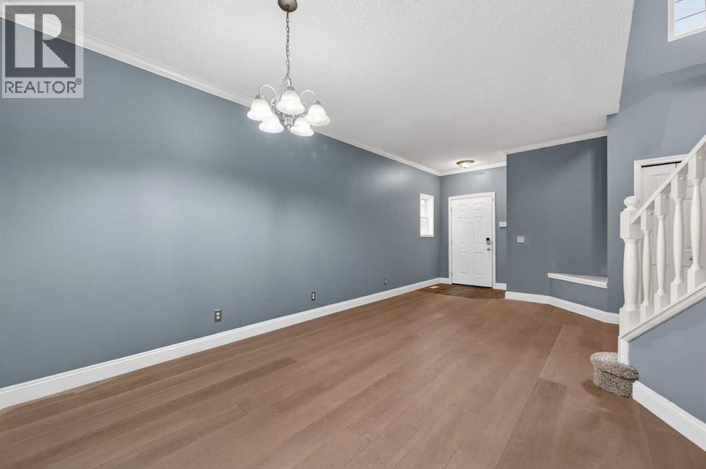 99 Evansbrooke Manor Nw, Calgary, Alberta  T2P 1C9 - Photo 5 - A2301438
