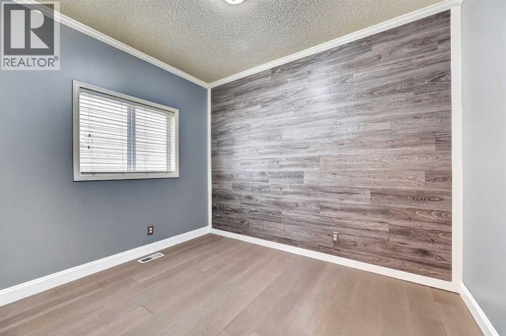 99 Evansbrooke Manor Nw, Calgary, Alberta  T2P 1C9 - Photo 15 - A2301438