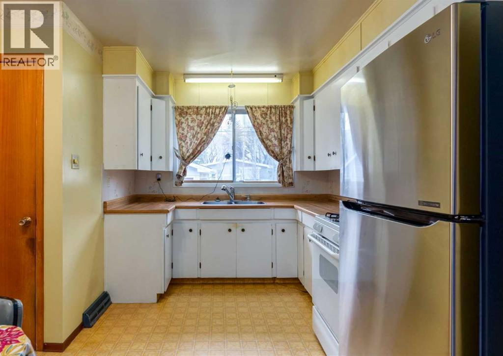 3007 Beil Avenue Nw, Calgary, Alberta  T2L 1K6 - Photo 9 - A2302252