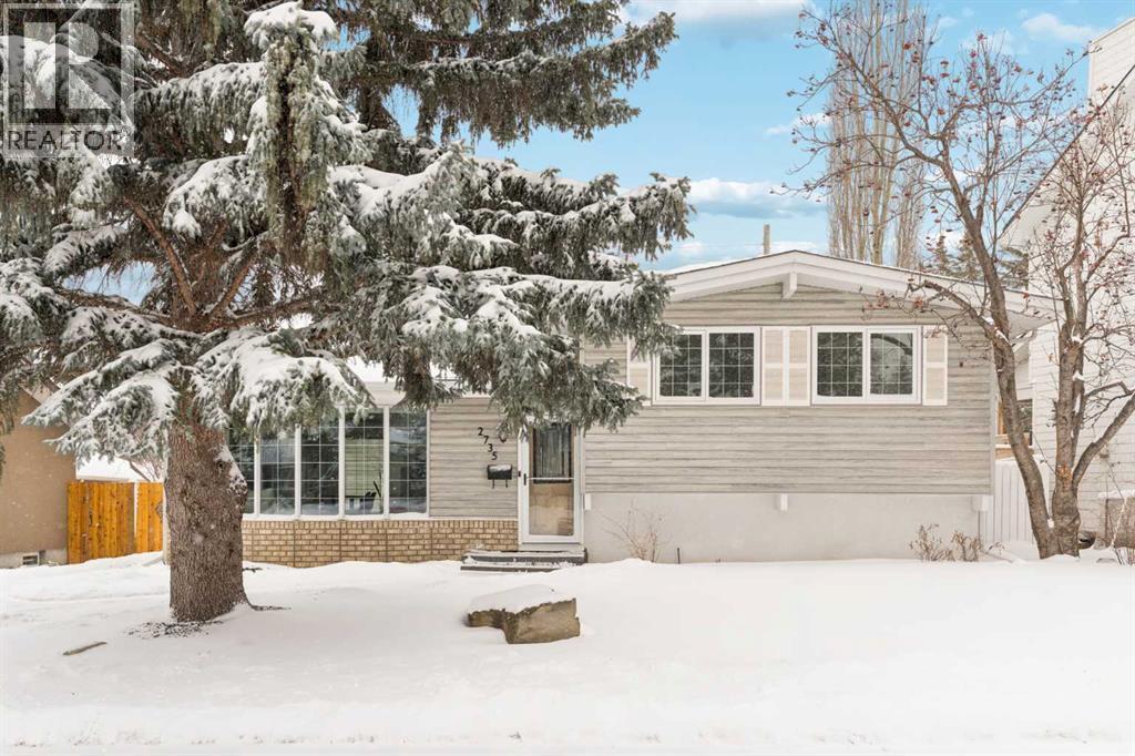 2735 Lionel Crescent Sw, Calgary, Alberta  T3E 6B1 - Photo 2 - A2300312