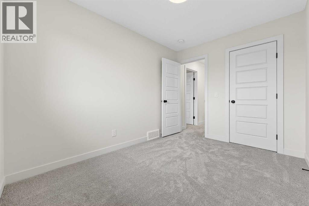 921 Cobblemore Common Sw, Airdrie, Alberta  T4B 5L9 - Photo 27 - A2302434