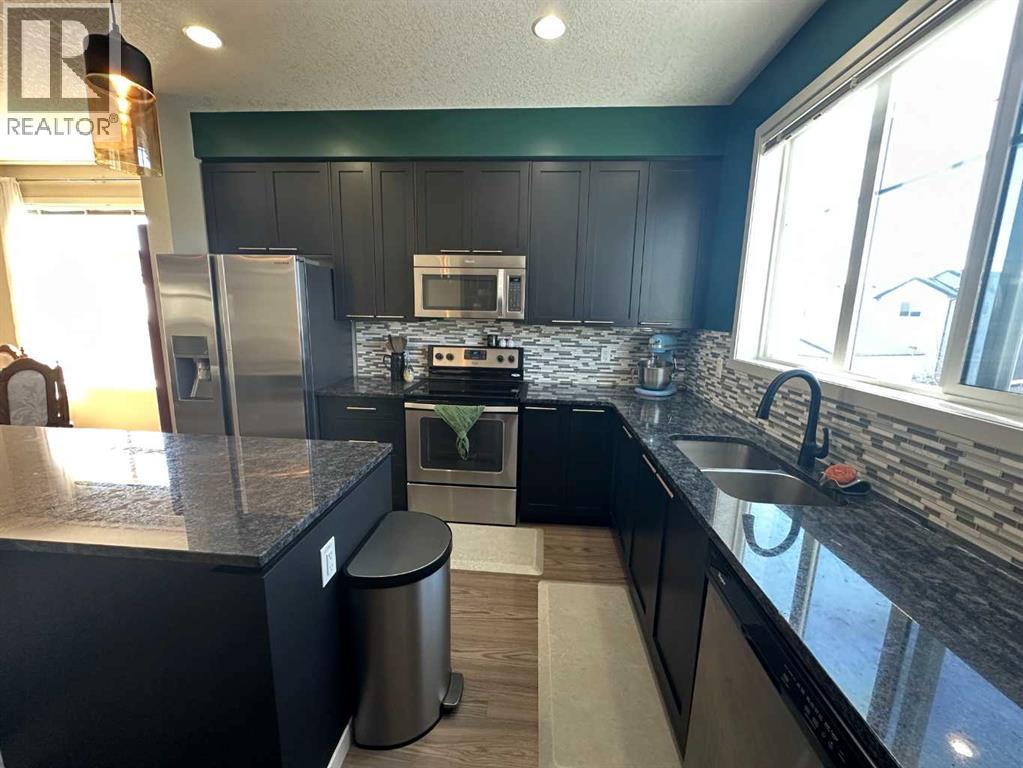 113 Copperpond Row Se, Calgary, Alberta  T2Z 1H3 - Photo 6 - A2302891