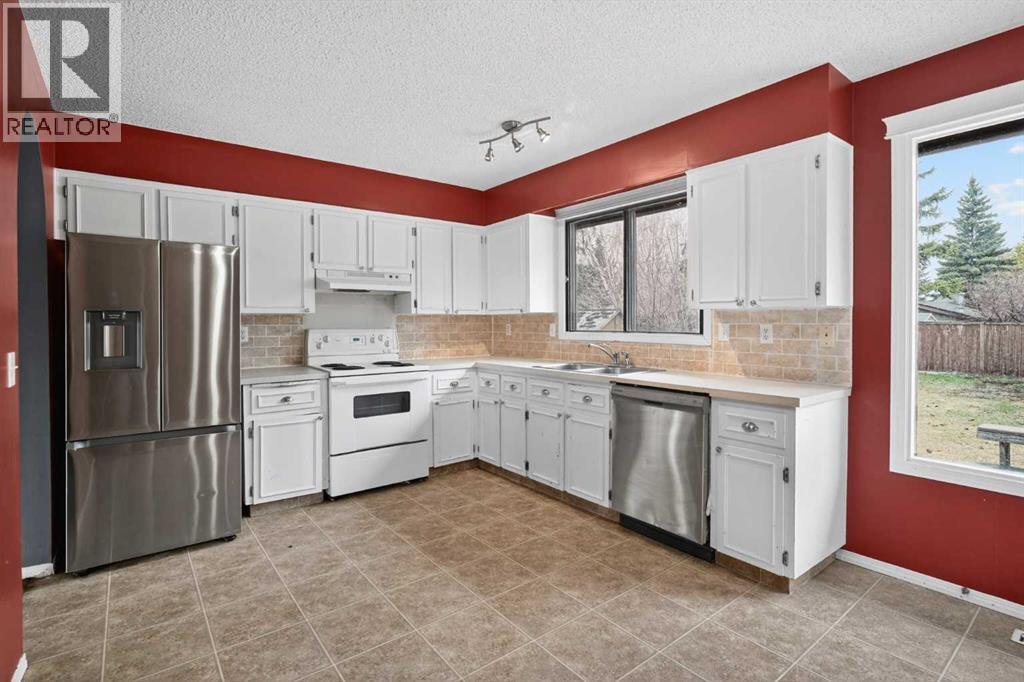 15131 Deer Run Drive Se, Calgary, Alberta  T2J 3H6 - Photo 3 - A2302596