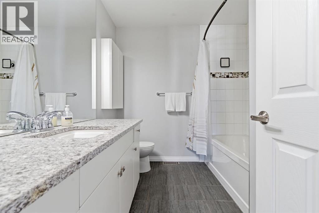 405 Windstone Grove SW, Airdrie, Alberta  T4B 2P9 - Photo 31 - A2292789