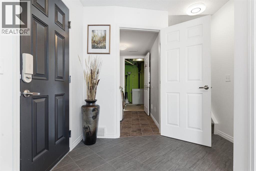 405 Windstone Grove SW, Airdrie, Alberta  T4B 2P9 - Photo 3 - A2292789