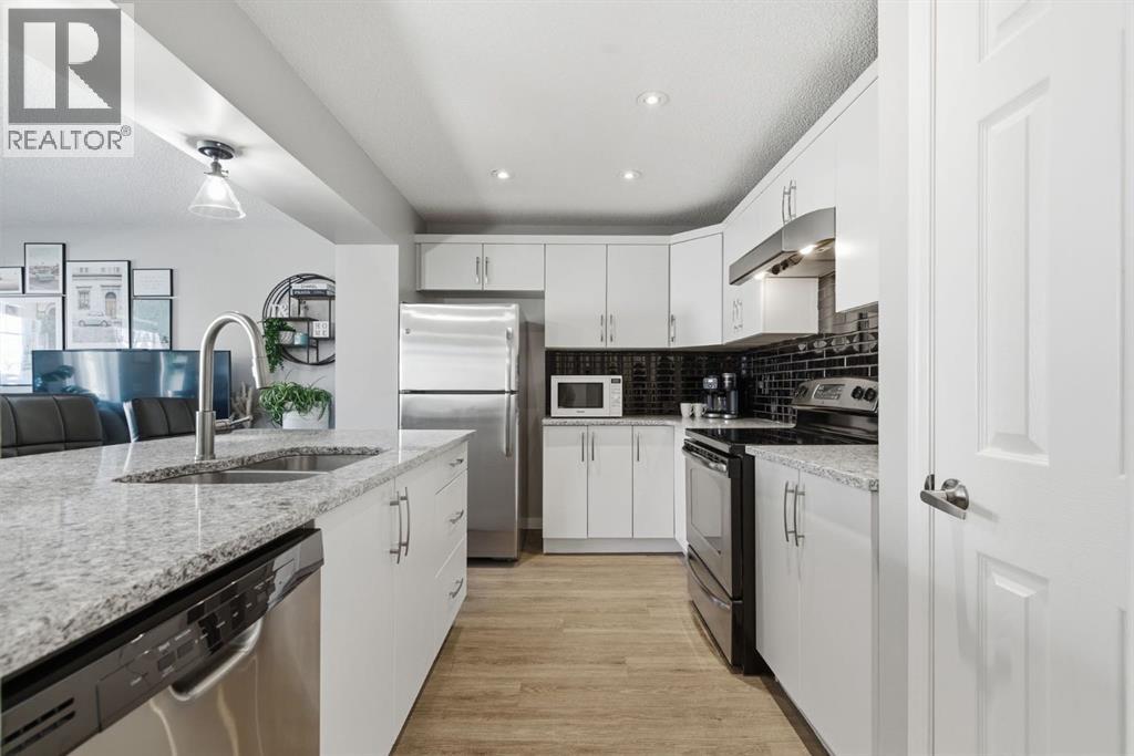 405 Windstone Grove SW, Airdrie, Alberta  T4B 2P9 - Photo 10 - A2292789