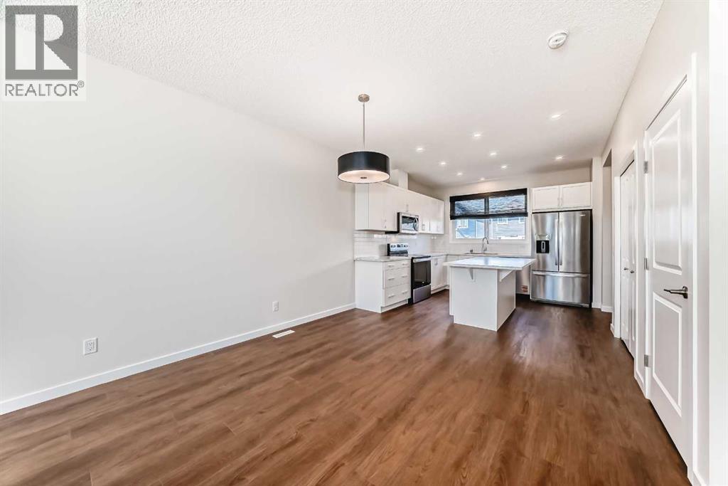 80 Magnolia Way SE, Calgary, Alberta  T3M 2W7 - Photo 5 - A2291460