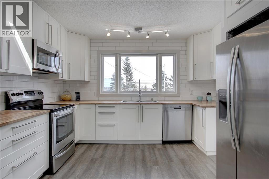 10212 7 Street SW, Calgary, Alberta  T2W 0G3 - Photo 9 - A2291733