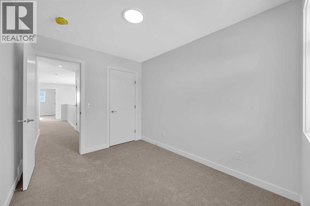 131 Ricardo Ranch Avenue SE, Calgary, Alberta  T3M 3Z7 - Photo 26 - A2288033