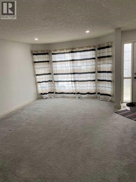 210 Saddlebrook Way NE, Calgary, Alberta  T3J 0B5 - Photo 8 - A2293645