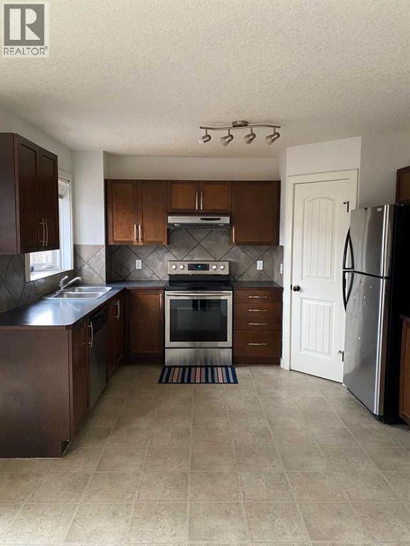 210 Saddlebrook Way NE, Calgary, Alberta  T3J 0B5 - Photo 4 - A2293645