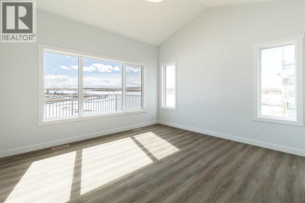 125 Monarch Bend NW, Rural Rocky View County, Alberta  T3Z 0K4 - Photo 12 - A2302248