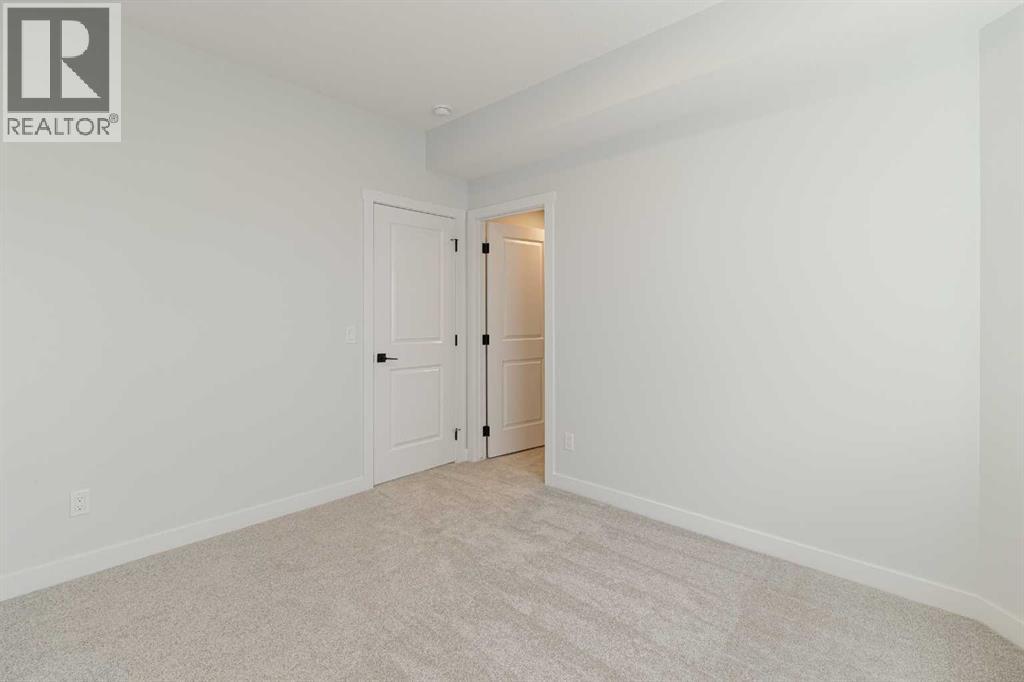 125 Monarch Bend NW, Rural Rocky View County, Alberta  T3Z 0K4 - Photo 29 - A2302248