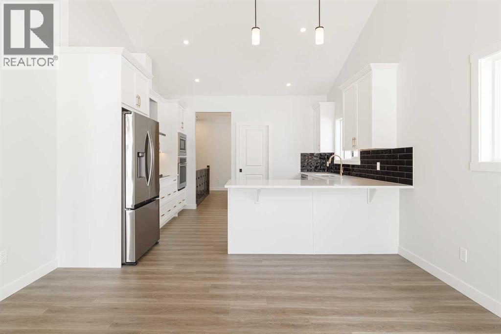 125 Monarch Bend NW, Rural Rocky View County, Alberta  T3Z 0K4 - Photo 9 - A2302248