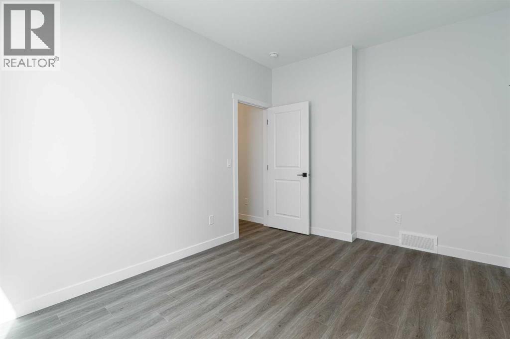 125 Monarch Bend NW, Rural Rocky View County, Alberta  T3Z 0K4 - Photo 18 - A2302248