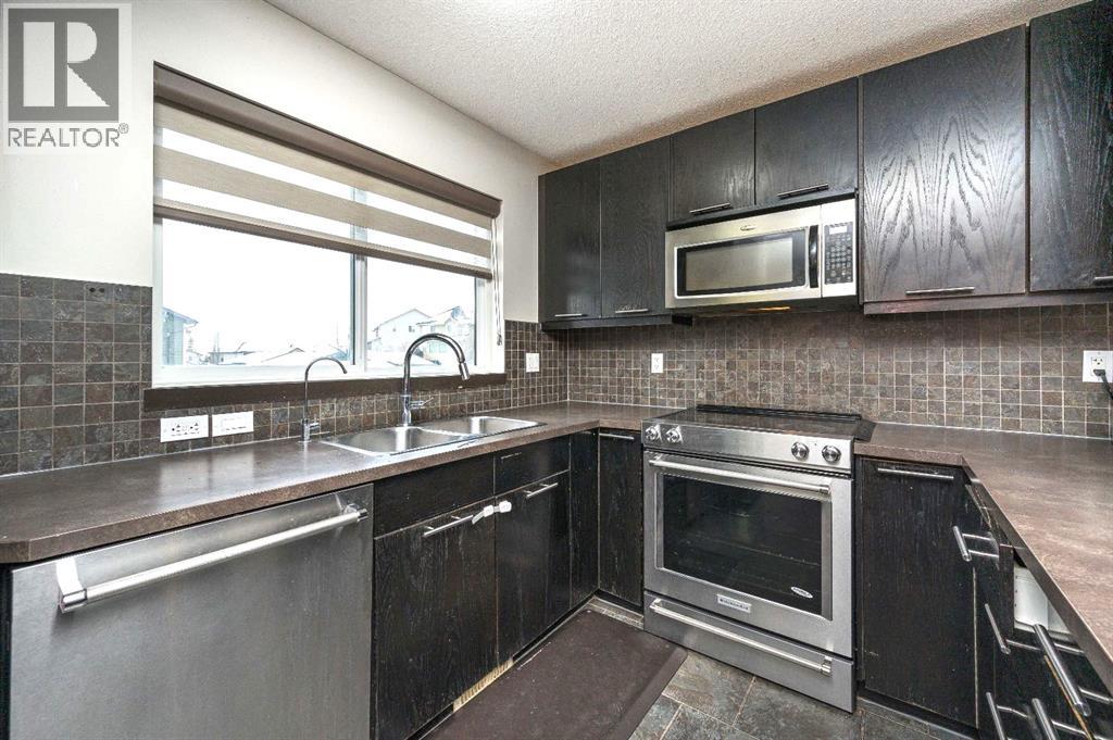 702 Panamount Boulevard NW, Calgary, Alberta  T3K 0P7 - Photo 8 - A2299325