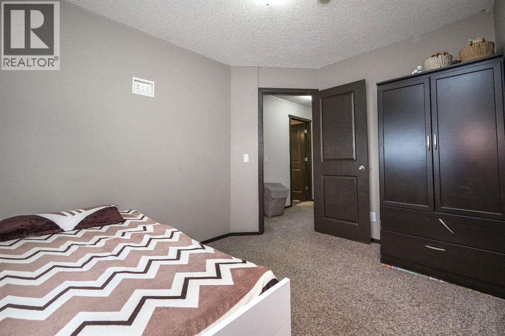 702 Panamount Boulevard NW, Calgary, Alberta  T3K 0P7 - Photo 18 - A2299325