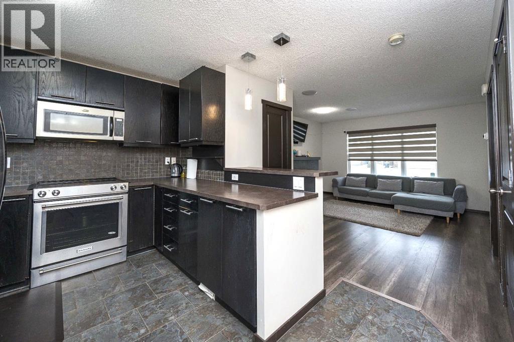 702 Panamount Boulevard NW, Calgary, Alberta  T3K 0P7 - Photo 9 - A2299325