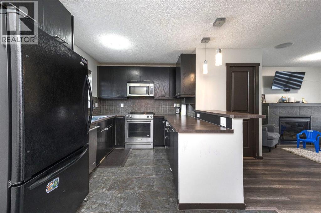 702 Panamount Boulevard NW, Calgary, Alberta  T3K 0P7 - Photo 10 - A2299325