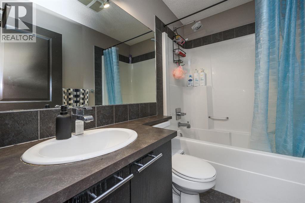 702 Panamount Boulevard NW, Calgary, Alberta  T3K 0P7 - Photo 22 - A2299325