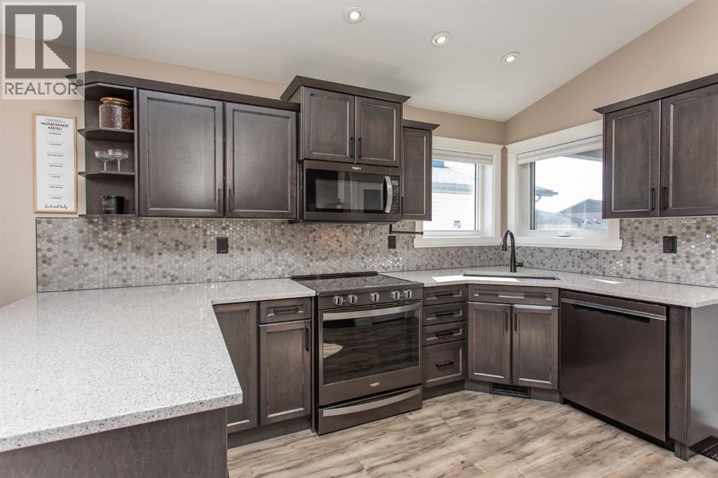 65 Mackenzie Avenue, Lacombe, Alberta  T4L 0H9 - Photo 10 - A2302752