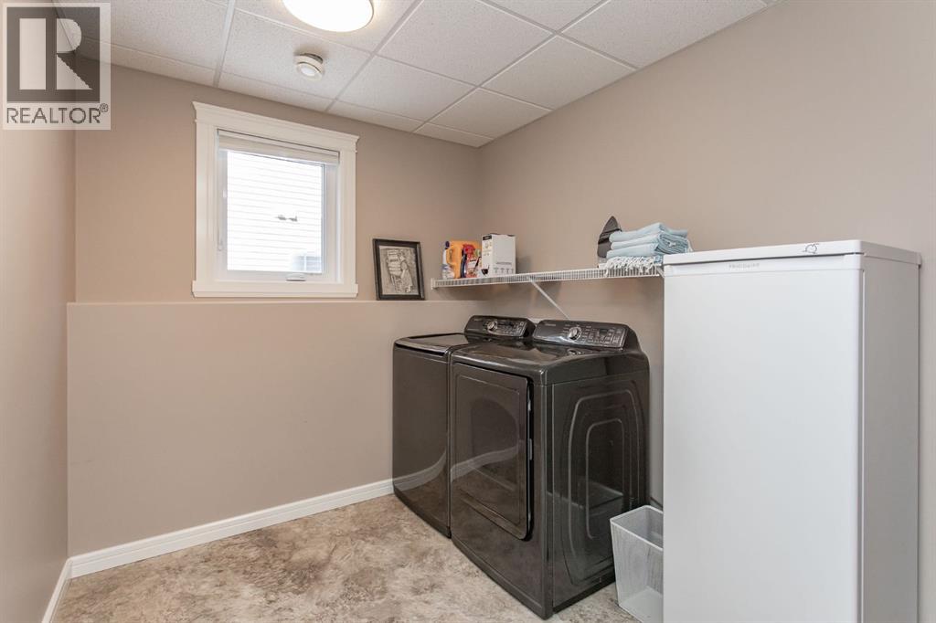 65 Mackenzie Avenue, Lacombe, Alberta  T4L 0H9 - Photo 22 - A2302752