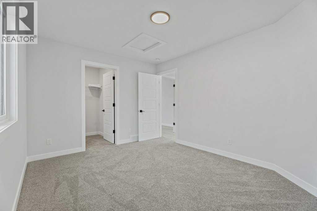 71 Ranchers View, Okotoks, Alberta  T1S 5R6 - Photo 36 - A2285159