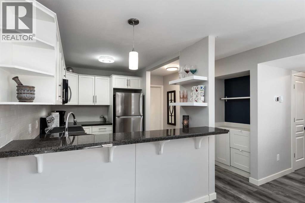 112, 25 Glamis Green SW, Calgary, Alberta  T3E 6V1 - Photo 6 - A2287121