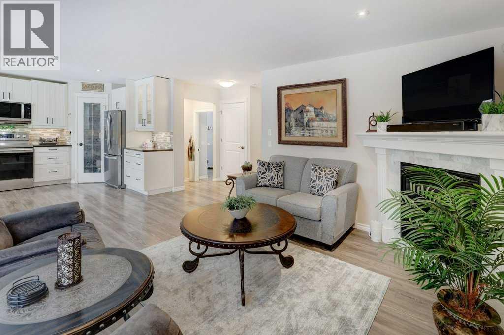 2033 Sagewood Point SW, Airdrie, Alberta  T4b 3P1 - Photo 10 - A2293088