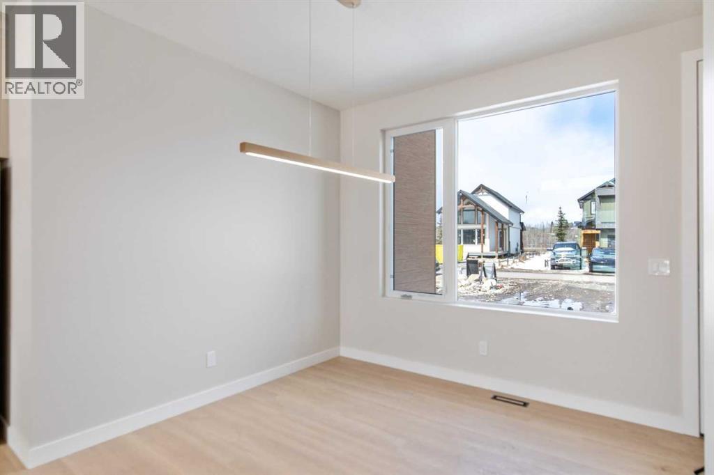 37 Cottageclub Lane, Rural Rocky View County, Alberta  T4C 1B1 - Photo 4 - A2303149