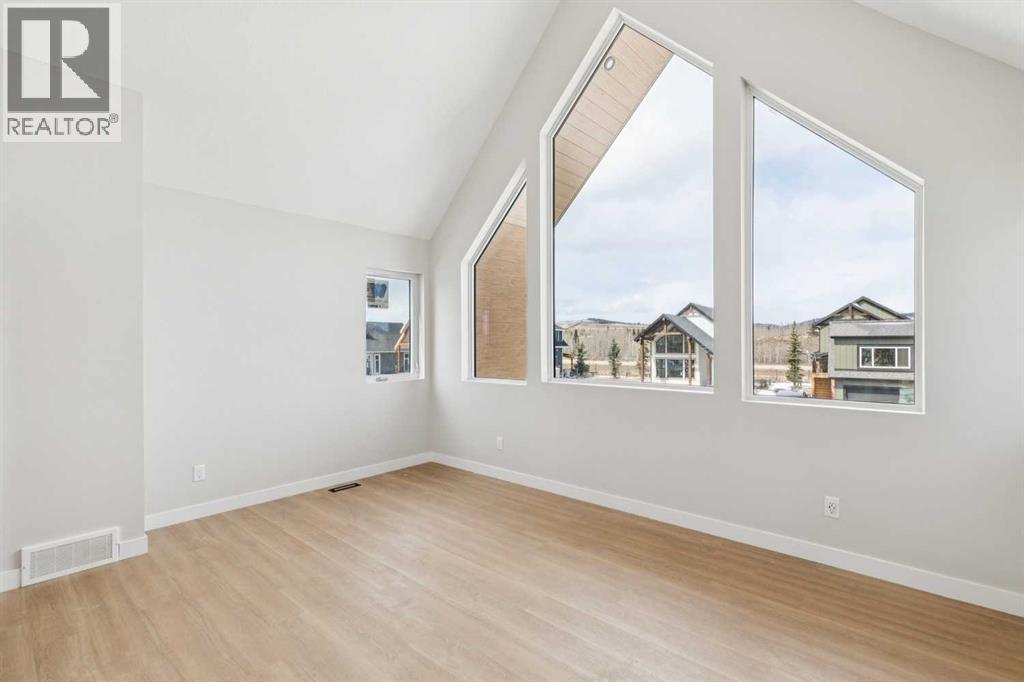 37 Cottageclub Lane, Rural Rocky View County, Alberta  T4C 1B1 - Photo 11 - A2303149