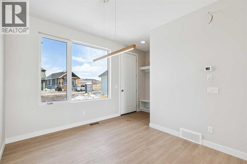 37 Cottageclub Lane, Rural Rocky View County, Alberta  T4C 1B1 - Photo 5 - A2303149