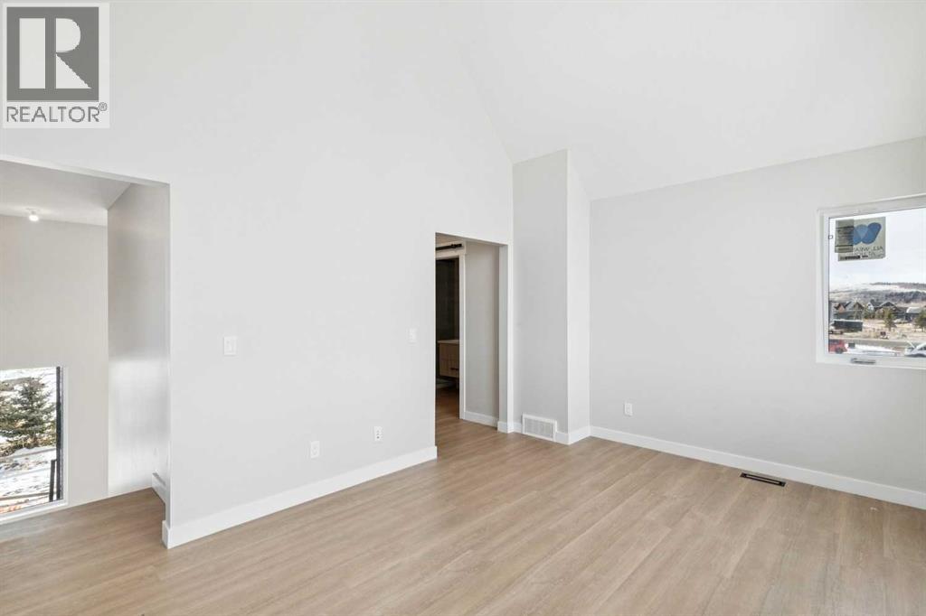 37 Cottageclub Lane, Rural Rocky View County, Alberta  T4C 1B1 - Photo 12 - A2303149