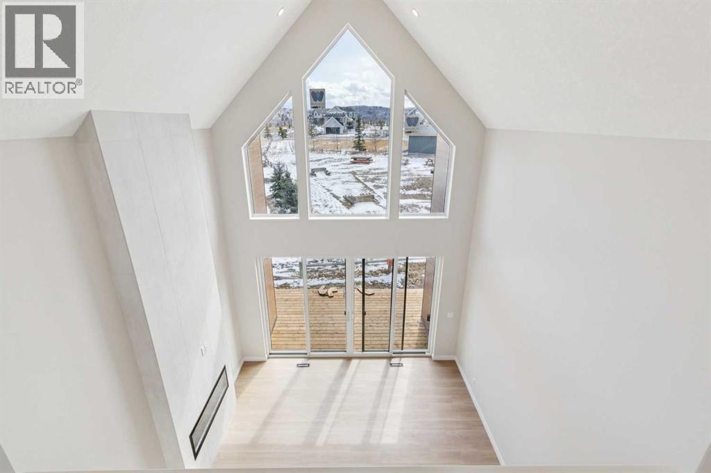 37 Cottageclub Lane, Rural Rocky View County, Alberta  T4C 1B1 - Photo 16 - A2303149