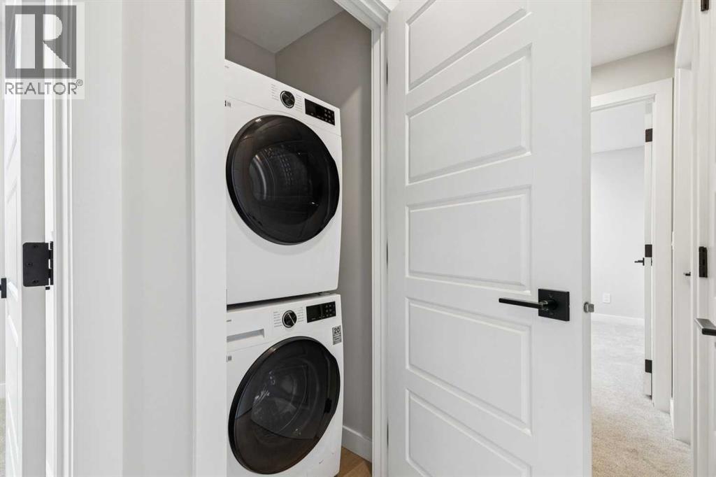 37 Cottageclub Lane, Rural Rocky View County, Alberta  T4C 1B1 - Photo 23 - A2303149